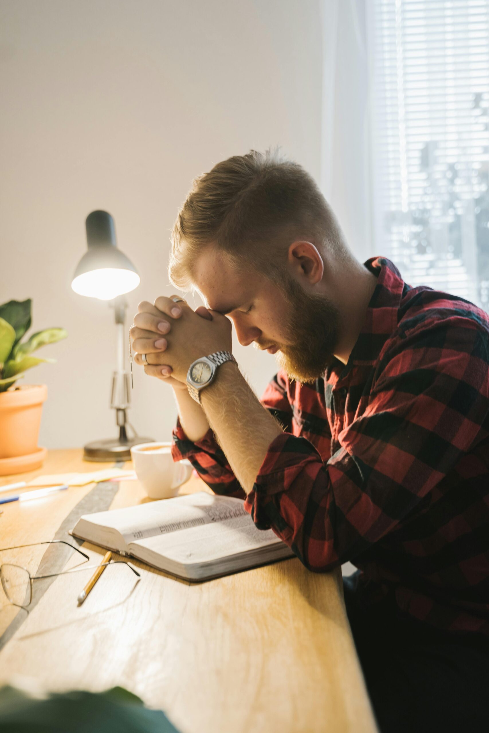 A MAN PRAYING