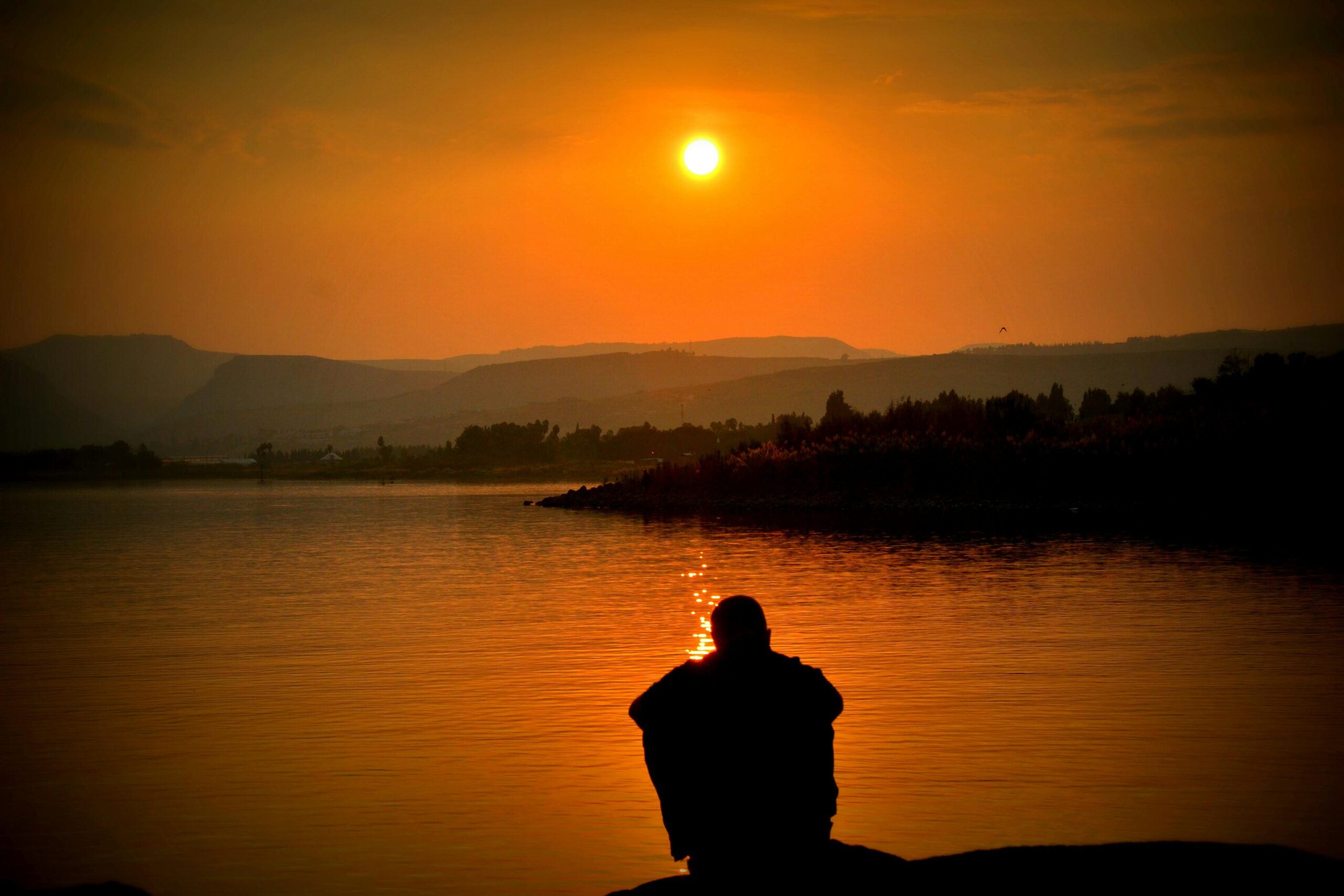 A sad man by the beach