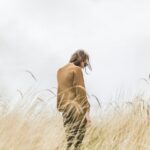 An unhappy man in a field