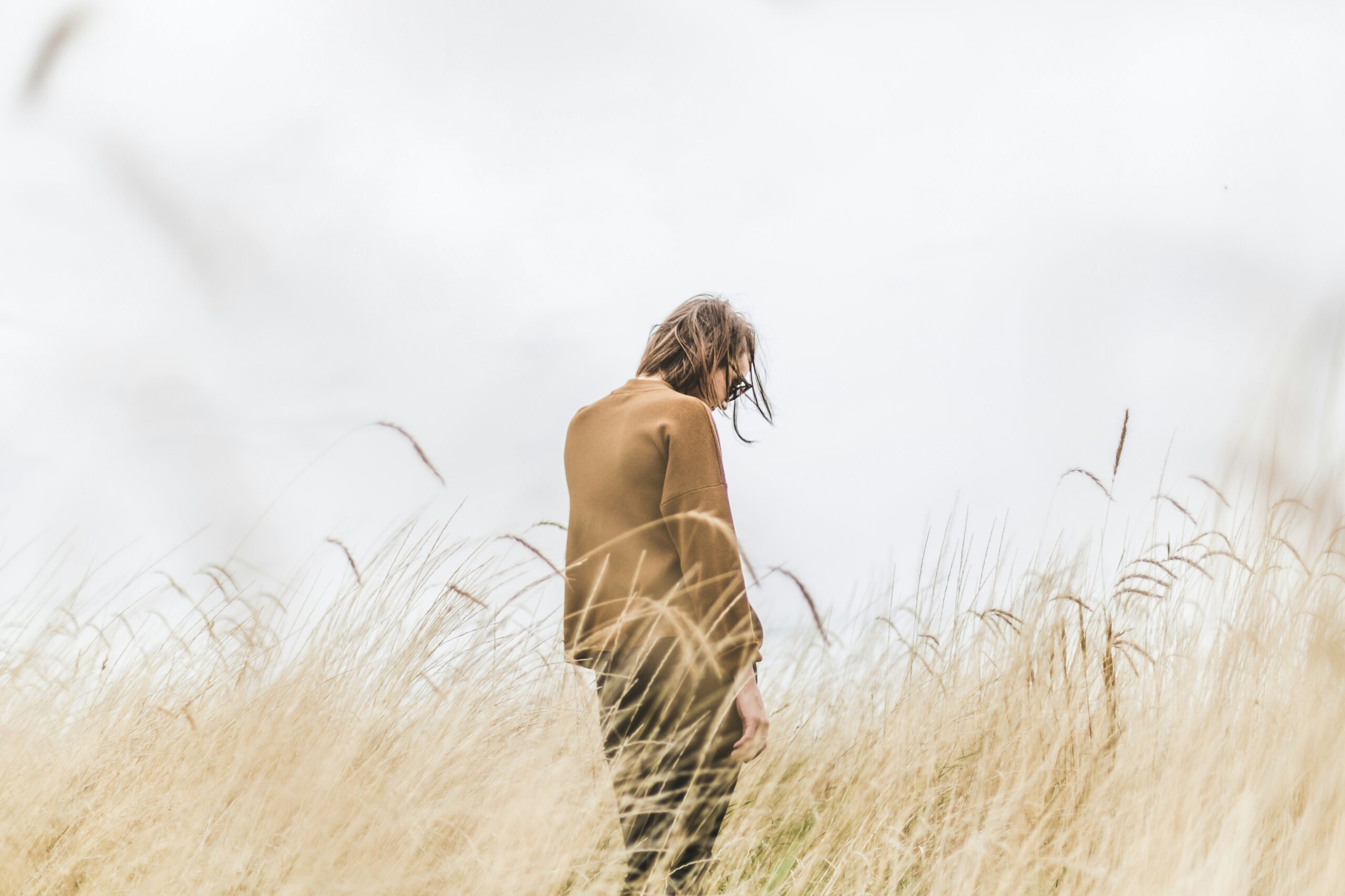 An unhappy man in a field