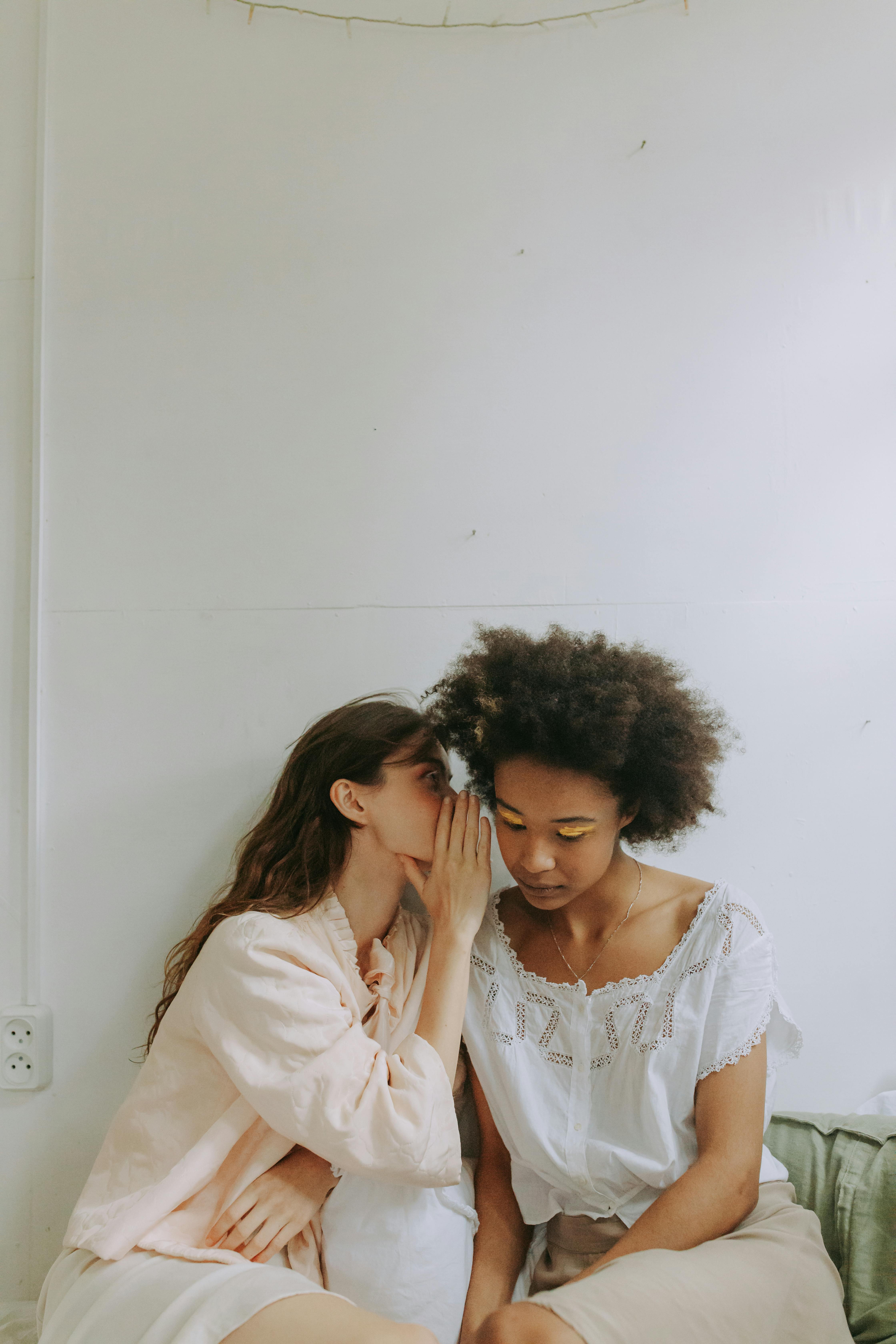 Two women gossiping