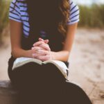 a WOMAN PRAYING