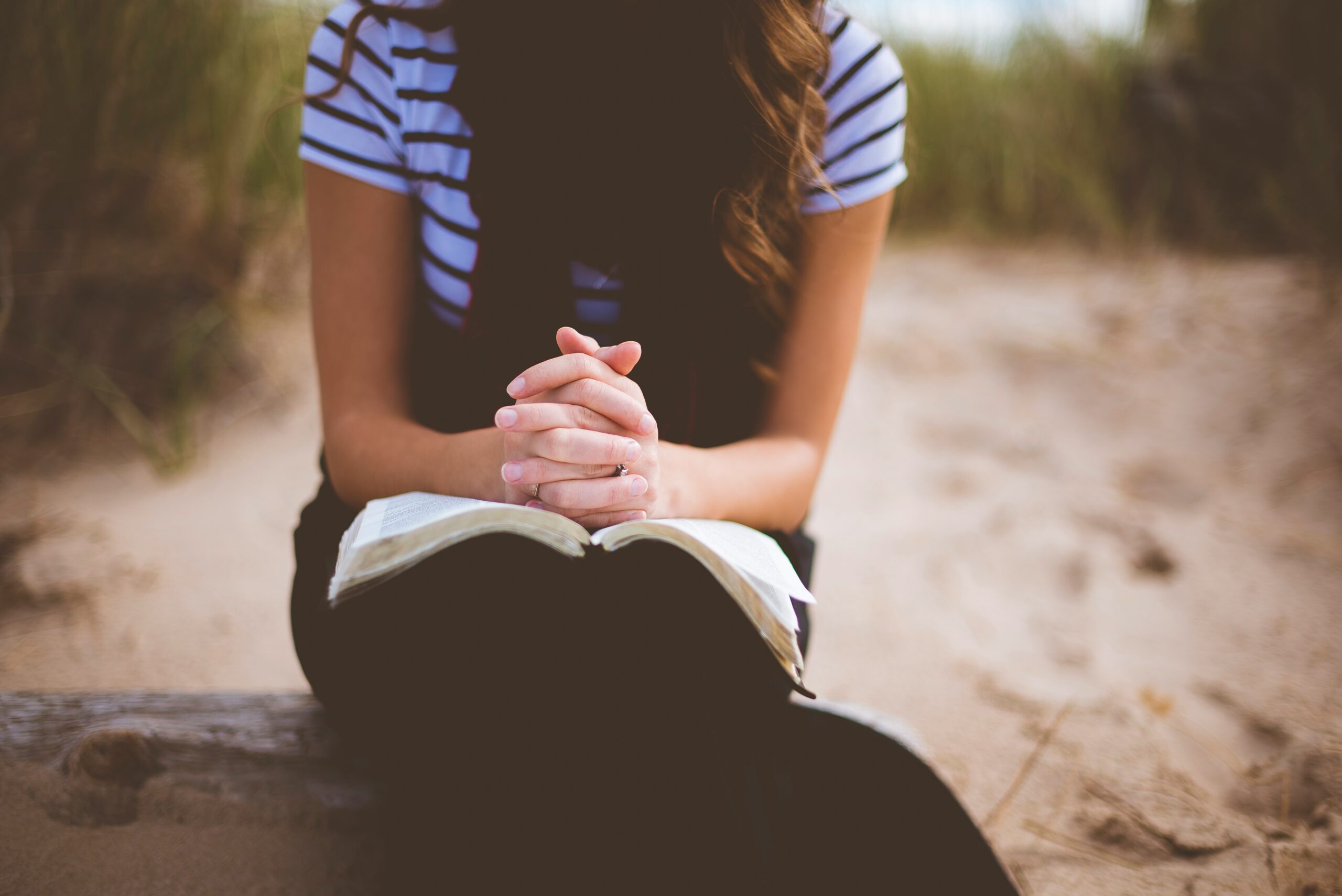 a WOMAN PRAYING